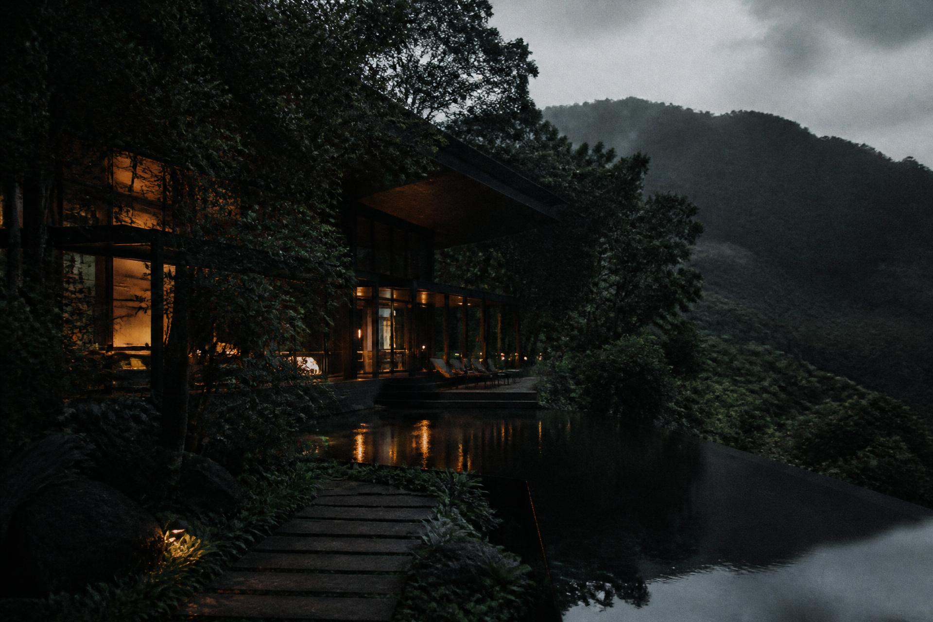 Nature-immersed luxury retreat property at dusk